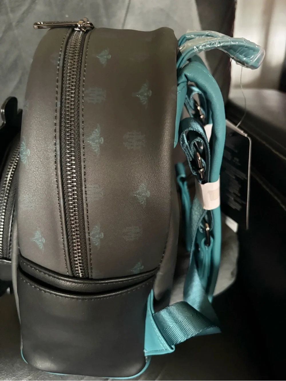 Loungefly Haunted Mansion Glow in the Dark Mini Backpack in Black and Teal